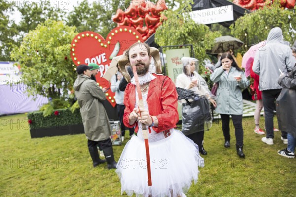 Cupid with bow and arrow at the Lollapalooza Festival in the Olympiastadion and on the Maifeld, Berlin, 12/07/2025