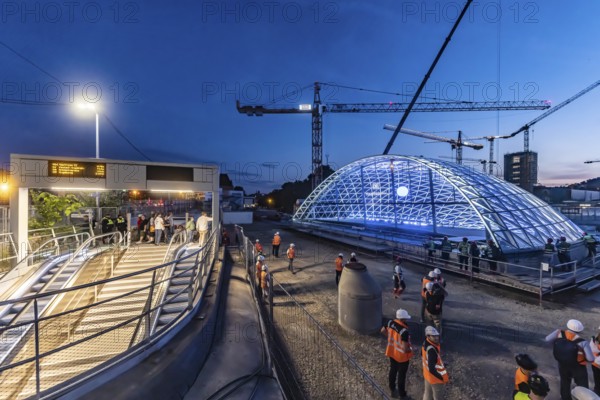 First entrance portal at the new Stuttgart main station completed. One of four so-called lattice shells, which travellers will use to access the underground through station in future, is revealed for the first time. The spectacular steel and glass construction was realised by façade specialist Seele and planned by christoph ingenhoven architects. Stuttgart, Baden-Württemberg, Germany