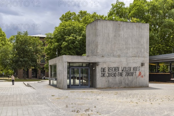 The rich want war. The youth want a future. Illegal protest at a building near the University of Stuttgart. Stuttgart, Baden-Württemberg, Germany