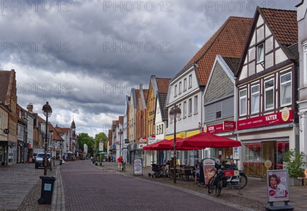 Buildings and shops in Lange Straße in the historic old town centre of Nienburg an der Weser. Nienburg, Lower Saxony, Germany