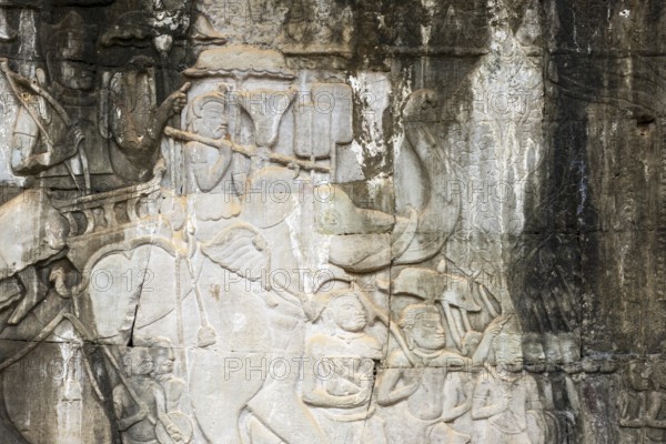 Stone bas-reliefs, Khmer war campaign against the Cham, relief wall, east façade, Bayon temple, Angkor Thom, Siem Reap province, Cambodia