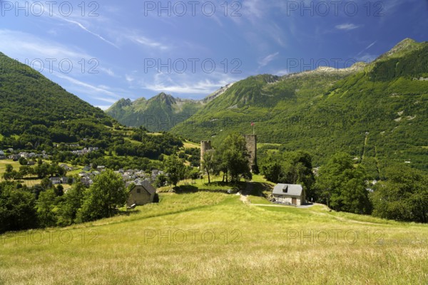 The ruins of the Château Sainte-Marie castle in Esterre and the mountain landscape near Luz-Saint-Sauveur, Pyrenees, France