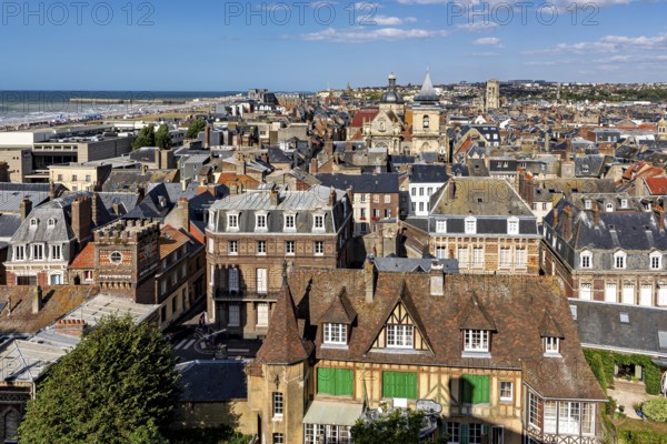 Town view with historic architecture and half-timbered houses on the coast under a blue sky, The town of Dieppe in Normandy, France