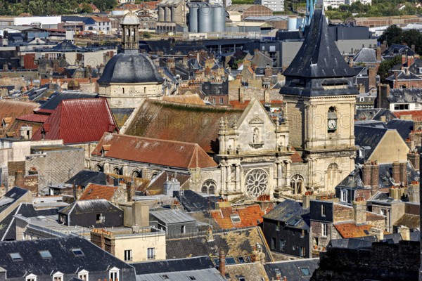 Historic town view with dominating church tower and old brick buildings, The town of Dieppe in Normandy, France