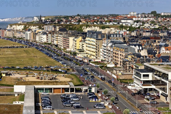 Coastal town with promenade along residential buildings and view of cliffs and sea, The town of Dieppe in Normandy, France