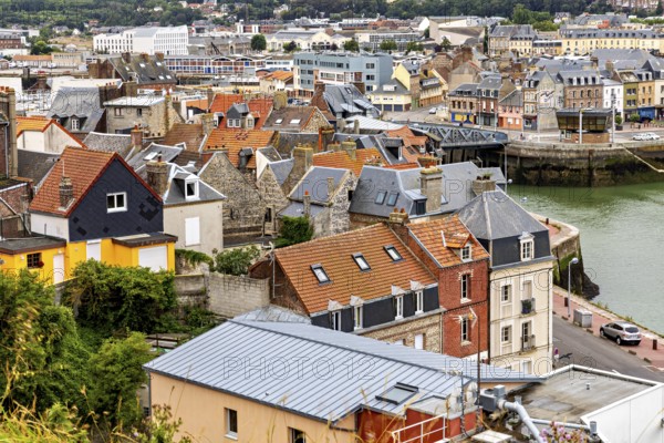 Colourful houses and roofs of the old town on the riverbank in a picturesque coastal town, The port of Dieppe in Normandy, France