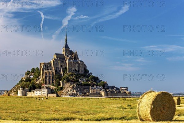 Imposing view of Mont Saint-Michel with a bale of straw in the foreground, Mont Saint Michel in Normandy, France