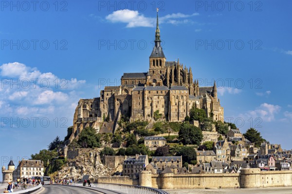 The historic monastery of Mont Saint-Michel against a bright blue sky, Mont Saint Michel in Normandy, France
