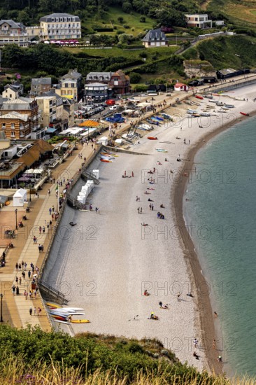 Aerial view of a beach with promenade and people playing, Etretat in Normandy, France