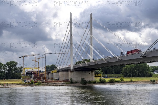 Rhine bridge Duisburg-Neuenkamp, motorway A40, start of construction of the second bridge, bridge piers and the first bridge segment are erected on the Neuenkamp side of the Rhine, North Rhine-Westphalia, Germany