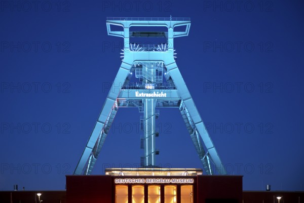 Illuminated headframe of the German Mining Museum at Extraschicht, Bochum, Ruhr area, North Rhine-Westphalia, Germany