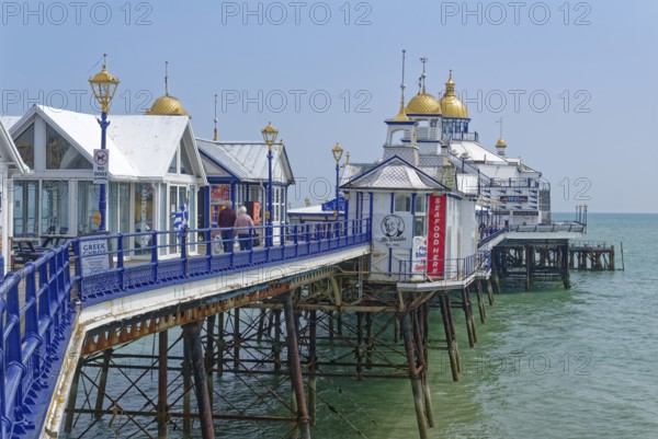 Beach and pier in Eastbourne, seaside resort on the English Channel, in the county of East Sussex, England, United Kingdom of Great Britain
