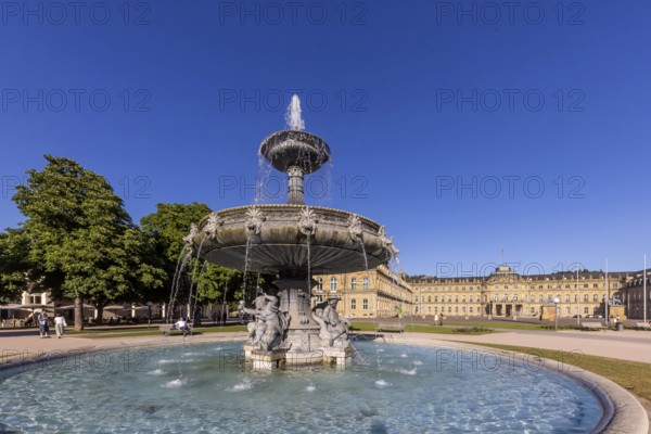 Schlossplatz Stuttgart with New Palace and fountain with fountain bowl. Place of interest in Stuttgart, Baden-Württemberg, Germany