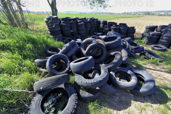 Old tyres in the landscape, car tyres