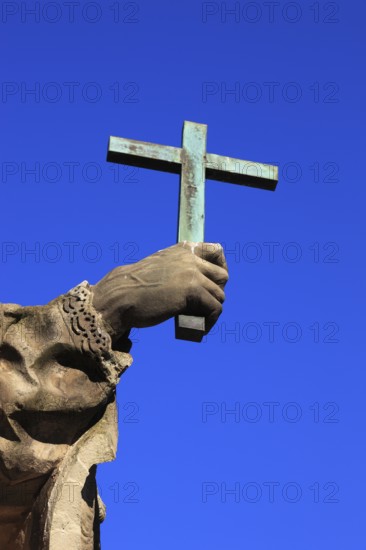 Detail of hand with cross, St John of Nepomuk on the Old Main Bridge, Würzburg, Lower Franconia, Bavaria, Germany