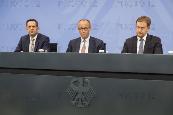 Olaf Lies (SPD, Minister President of Lower Saxony), Friedrich Merz (CDU, Federal Chancellor) and Michael Kretschmer (CDU, Minister President of the Free State of Saxony) during a press conference after the consultation between Federal Chancellor Friedrich Merz and the heads of government of the federal states at the Federal Chancellery, Berlin, 18 June 2025