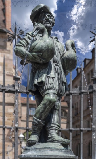 Goose-man fountain, created by the ore caster Pankraz Labenwolf around 1550, Rathausplatz, Nuremberg, Middle Franconia, Bavaria, Germany