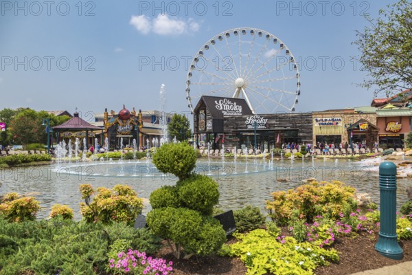 The Wheel ferris wheel behind the Ole Smoky Moonshine store at The Island recreation center in Pigeon Forge, Tennessee
