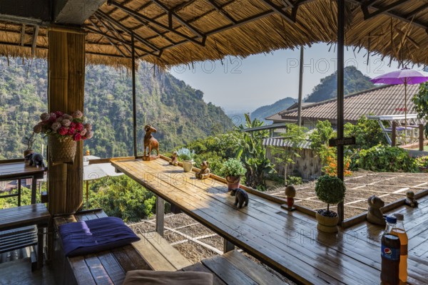 Stairs lead down to the Doi Phamee coffee shop and restaurant in Mae Sai district of Chiang Rai, Thailand