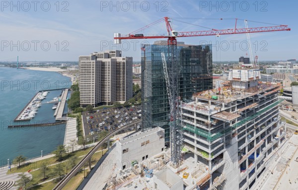 Detroit, Michigan - Construction of the 25-story JW Marriott Detroit Water Square hotel. The building is next to the new luxury Water Square apartment building