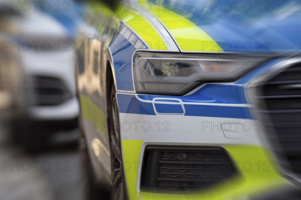 Symbolic image police operation: close-up of police emergency vehicles