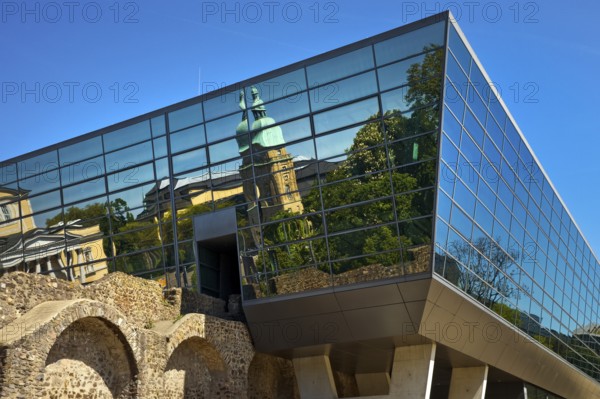 West side of the Darmstadtium congress centre with historic city wall in the centre of Darmstadt, Hesse, Germany
