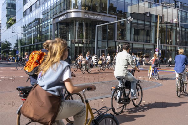 Central cycle path along the Vredenburg, in the city centre of Utrecht, lanes for pedestrians, cyclists and local traffic are separated, dense traffic, no car/truck traffic, Utrecht, Netherlands