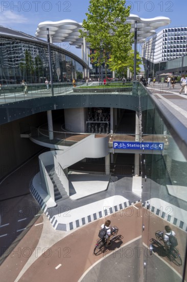 Entrance and exit to the central bicycle car park at Stationsplein, the largest bicycle car park in the world with over 13, 000 parking spaces on 3 floors, directly under the central station, Utrecht Centraal, Netherlands