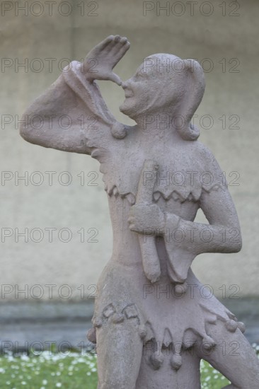 Sculpture of Till Eulenspiegel with gesture, thumb on nose, arm, high, up, hand, Bernburg, Saxony-Anhalt, Germany
