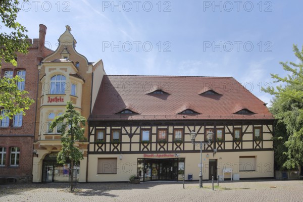 Historic town pharmacy, half-timbered house, market, Bitterfeld, Saxony-Anhalt, Germany