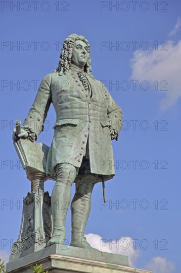 Sculpture Handel monument by Hermann Heidel 1859, George Frideric Handel with music stand, music stand and score, historical clothing, baroque, free-standing, Handel monument, market square, Halle an der Saale, Saxony-Anhalt, Germany