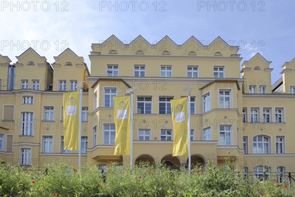 St Elisabeth Hospital with flags, Halle an der Saale, Saxony-Anhalt, Germany
