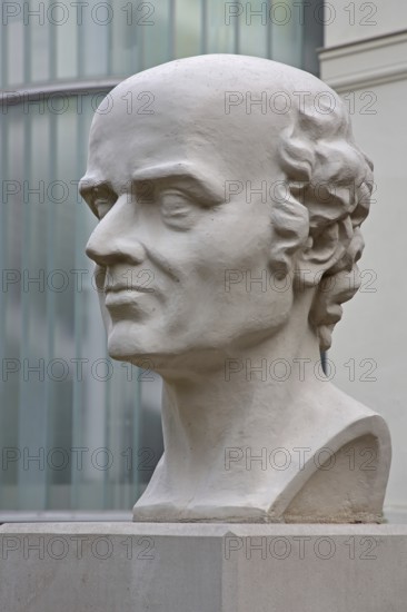 Memorial to the physician, doctor and founder of homeopathy Samuel Hahnemann, sculpture, head, bust, inscription, European Library of Homeopathy, Köthen, Saxony-Anhalt, Germany