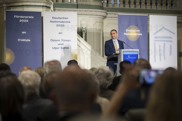 Ugur Sahin (founder of Biontech SE) gives an acceptance speech after receiving the German National Prize 2025 at the Französische Friedrichstadtkirche, Berlin, on 10 June 2025