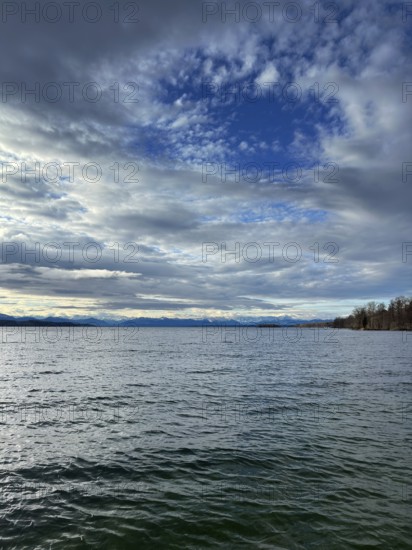 Lots of clouds over Lake Starnberg, Bavaria, Germany