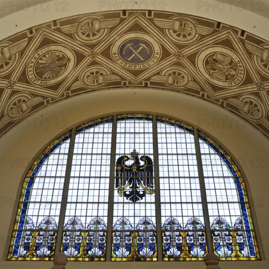 A stained glass window in the railway station with an imperial eagle is a reminder of the imperial era of Wilhelm II in Bad Homburg vor der Höhe, Hesse, Germany