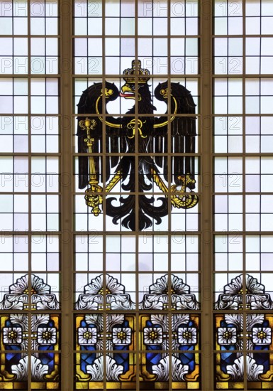 A stained glass window in the railway station with an imperial eagle is a reminder of the imperial era of Wilhelm II in Bad Homburg vor der Höhe, Hesse, Germany