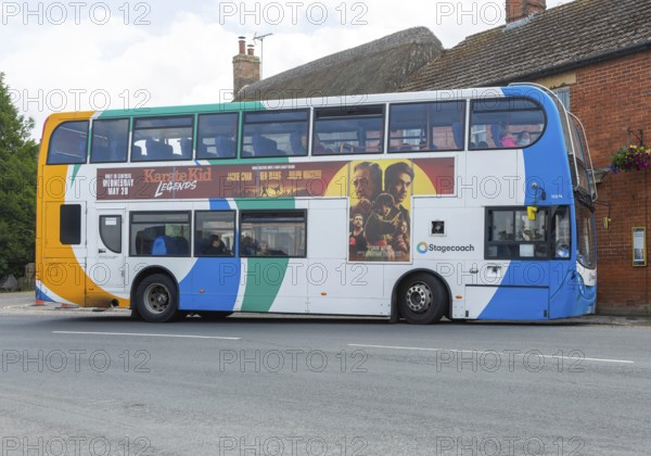 Stagecoach double decker Scania Enviro400 bus at bus stop, village of Avebury, Wiltshire, England, UK