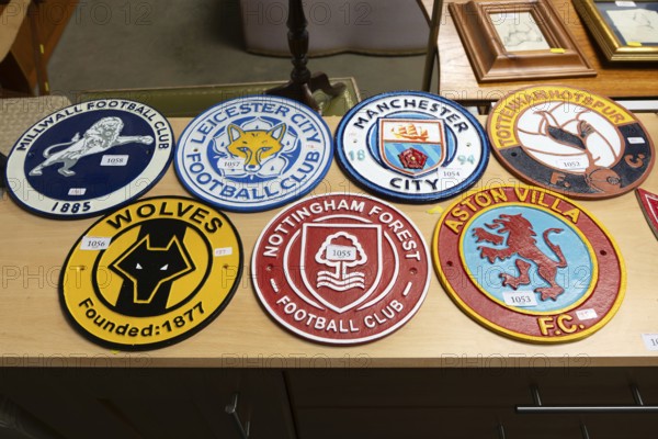 Metal replica football soccer club team crests or badges, Suffolk, England, UK