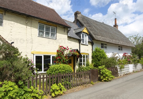 Attractive historic cottages in village of Avebury, Wiltshire, England, UK
