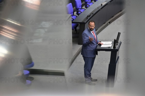 Jens Behrens (SPD) speaks on the agenda item on compulsory livestock labelling at the eleventh sitting of the Bundestag
