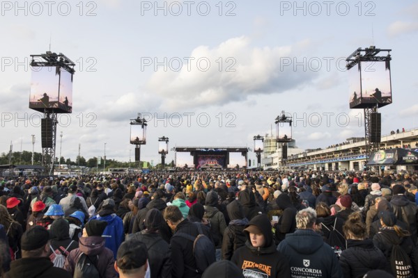 Festival visitors in front of the Utopia Stage at the Rock am Ring Festival on Sunday, Nürburgring race track race track, 08.06.2025