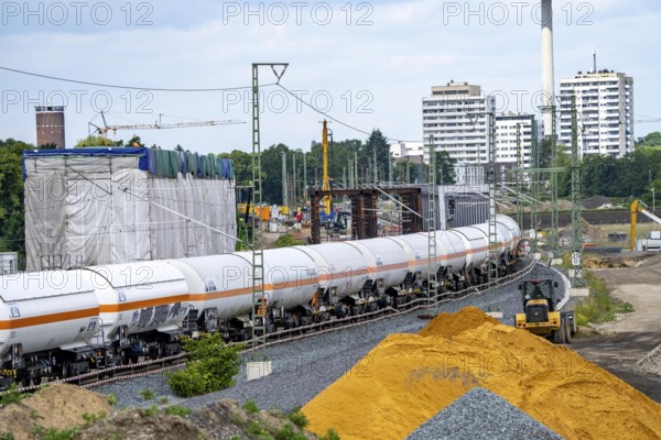 Reconstruction, extension of the Emmerich-Oberhausen railway line, three tracks, including 47 new or adapted bridges, here the new construction of railway bridges over the Lippe near Wesel, currently only 1 track in operation, goods train, the old bridges are replaced by new ones, extension of the Dutch Betuwe line from the port of Rotterdam, part of the European freight transport corridor Rotterdam-Genoa, 1300 KM long, Wesel, North Rhine-Westphalia, Germany
