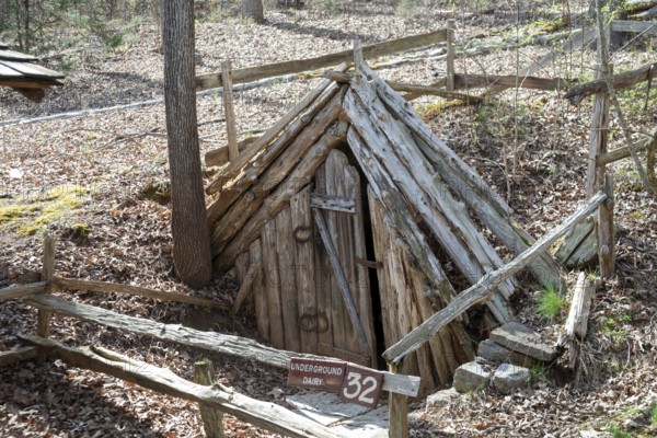 Clinton, Tennessee - The Museum of Appalachia, a collection of pioneer buildings and artifacts. The underground dairy was used to store milk and other perishables