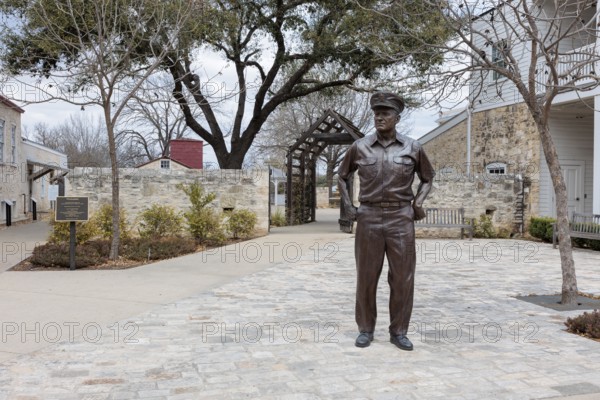 Bronze sculpture of Admiral Chester W. Nimitz by artist Rip Caswell at the Nimitzplatz plaza in Fredericksburg, Texas, USA
