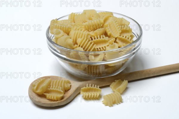 Italian pasta in a glass bowl, Radiatori variety