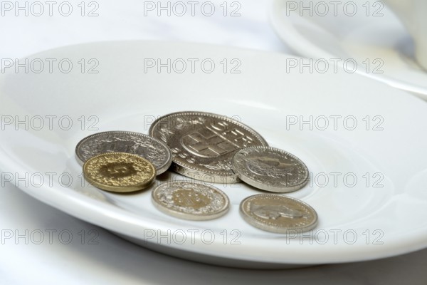 Tip, Swiss coins on plate, Switzerland