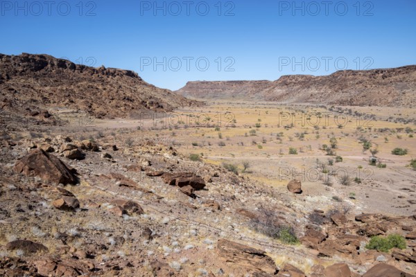 Barren landscape in a valley, Twyfelfontein, Kunene, Namibia