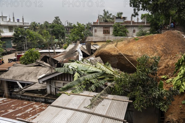 Damaged houses after a major landslide, triggered by a heavy downpour, in Guwahati, India, on June 7, 2025. One person was reported missing in thr landslide and two houses damaged