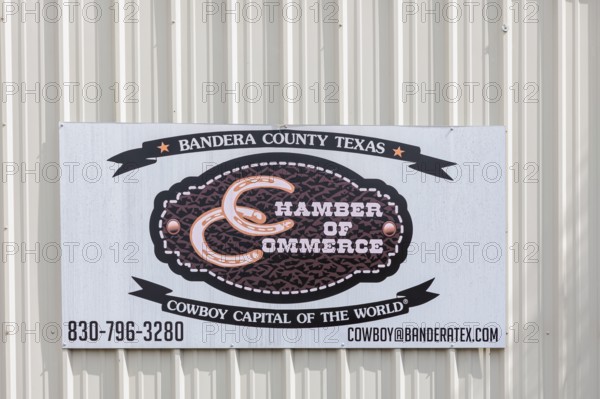 Sign for the Bandera County Chamber of Commerce in Bandera, Texas, USA